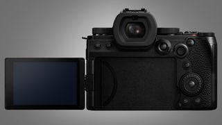 The back of the Panasonic Lumix S5IIX camera on a grey background