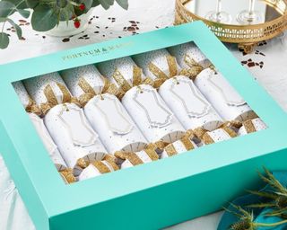 Fortnum & Mason Snowy Christmas Crackers, Set of 6 in blue box on table