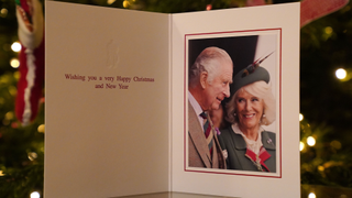 The 2022 Christmas card of King Charles III and the Queen Consort in front of a Christmas tree in Clarence House, London, on December 11, 2022 in London, England. The photograph was taken at the Braemar Games on the 3rd September 2022 by Samir Hussein