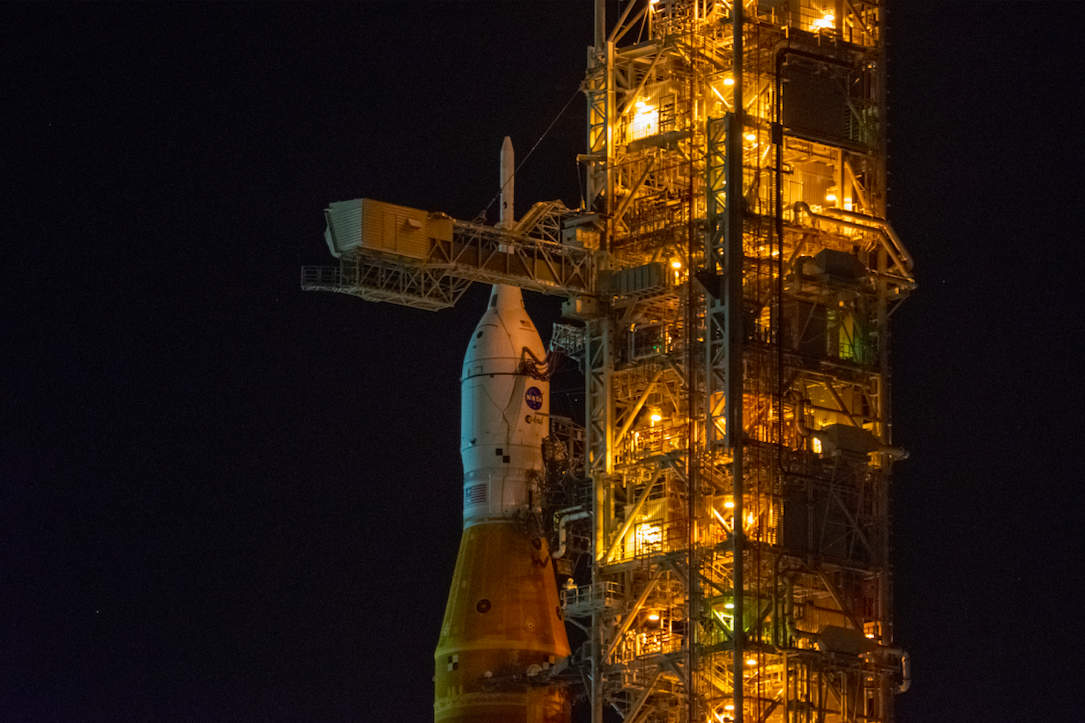 A close-up of the Artemis 1 Orion capsule during the mission's pushback from the launch pad to the Vehicle Assembly Building at NASA's Kennedy Space Center on April 25-26, 2022.