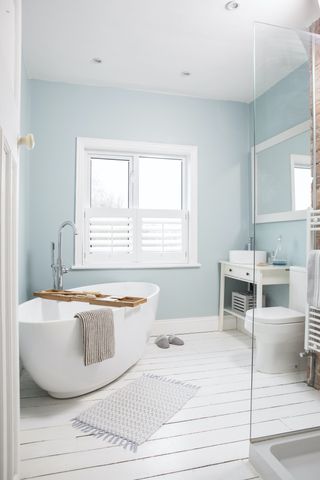 Kate ripped out the old pink bathroom suite and replaced it with a modern suite with freestanding oval bath; once she'd done this and renovated one of the two bedrooms, she moved in while she completed the rest of the house. 