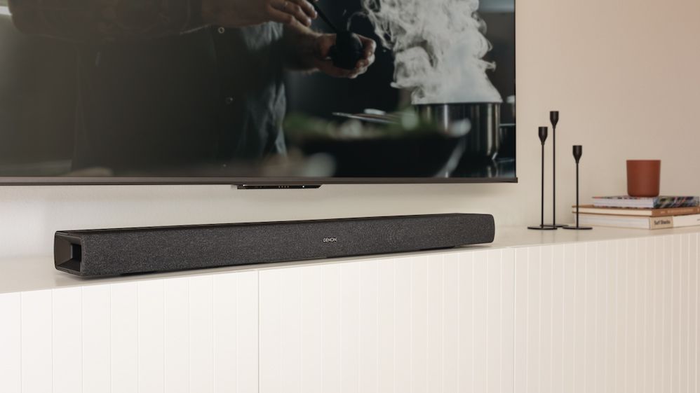 the denon dht-s217 soundbar beneath a TV