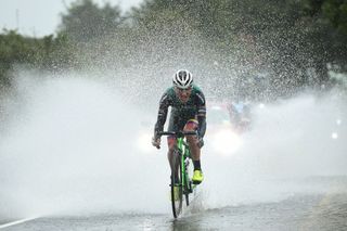 Ecuador's Jefferson Cepeda kicks up some spray going through one of the many large puddles on the course of the elite men's road race at the 2019 World Championships in Yorkshire