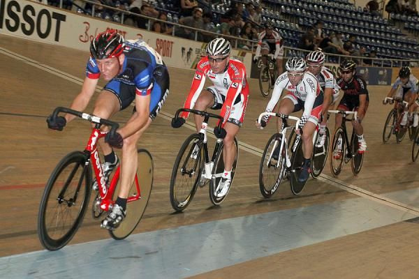 Chris Carlson and Andrew Armstrong paired to take the first sprint in the Men's Madison.