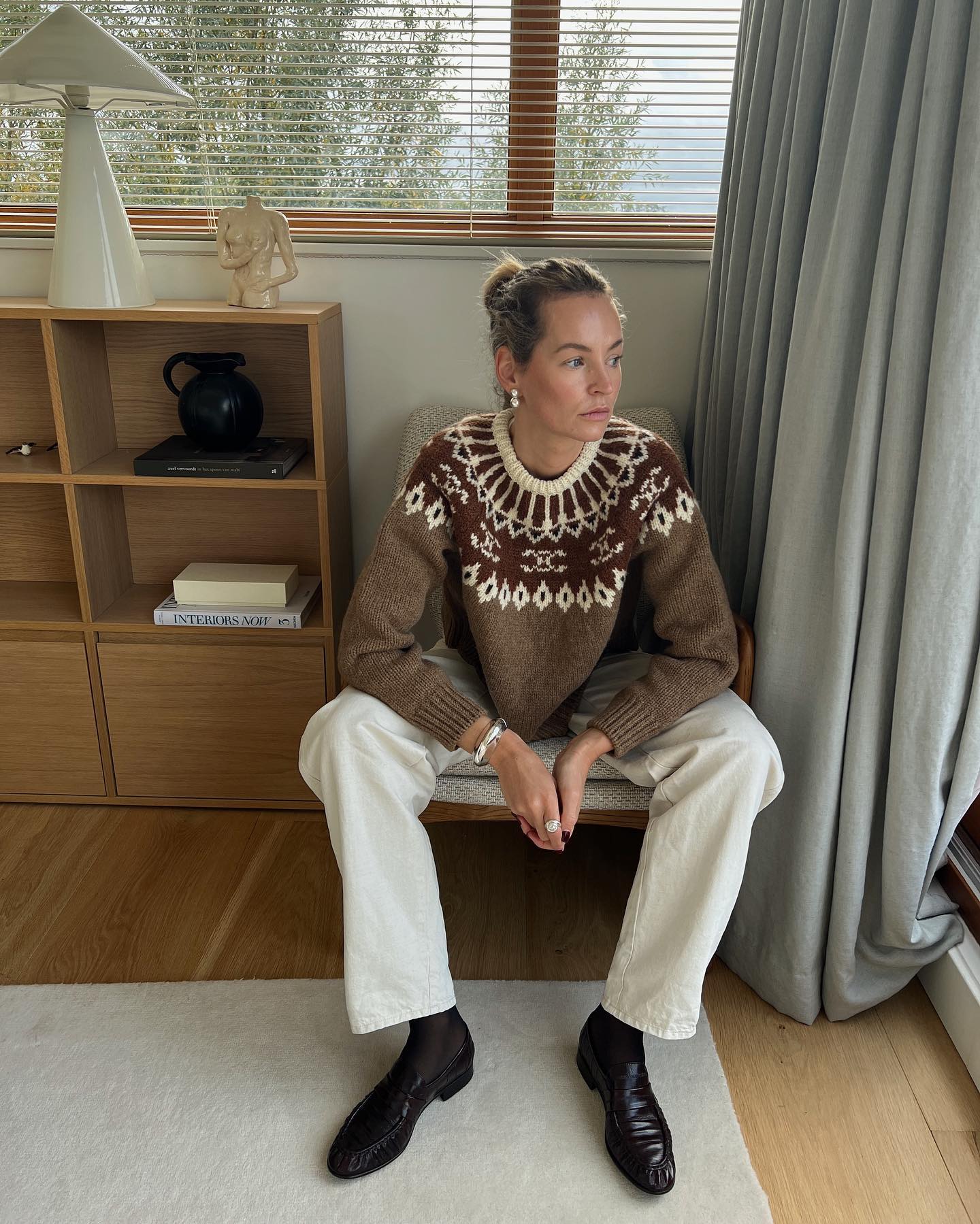 Influencer Anouk Yve wearing a Fair Isle jumper.