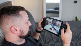 Playing Astrobot on PS5 Pro remotely on a tablet with the Razer Kishi Ultra mobile game controller while lying in bed