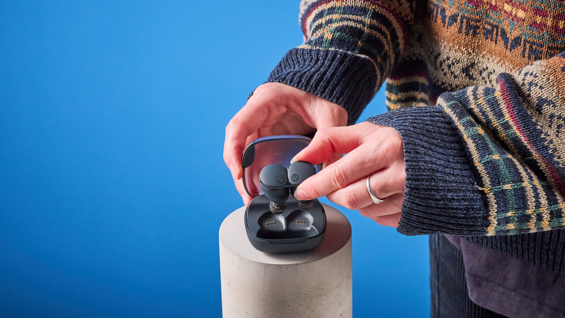 Audio-Technica ATH-CKS50TW2 in black colorway photographed ona blue background