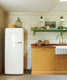 Kitchen with a 60s style smeg fridge