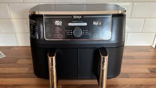 The Ninja Foodi Max Dual Zone Air Fryer AF400UK on a kitchen countertop