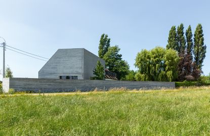 pringiers family concrete retreat in belgian countryside exterior