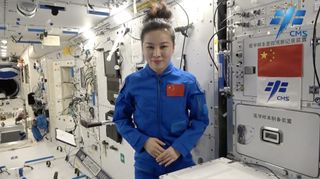 China's Shenzhou 13 astronaut Wang Yaping sends an International Women's Day greeting to women everywhere from aboard the Tiangong space station module Tianhe on March 8, 2022.
