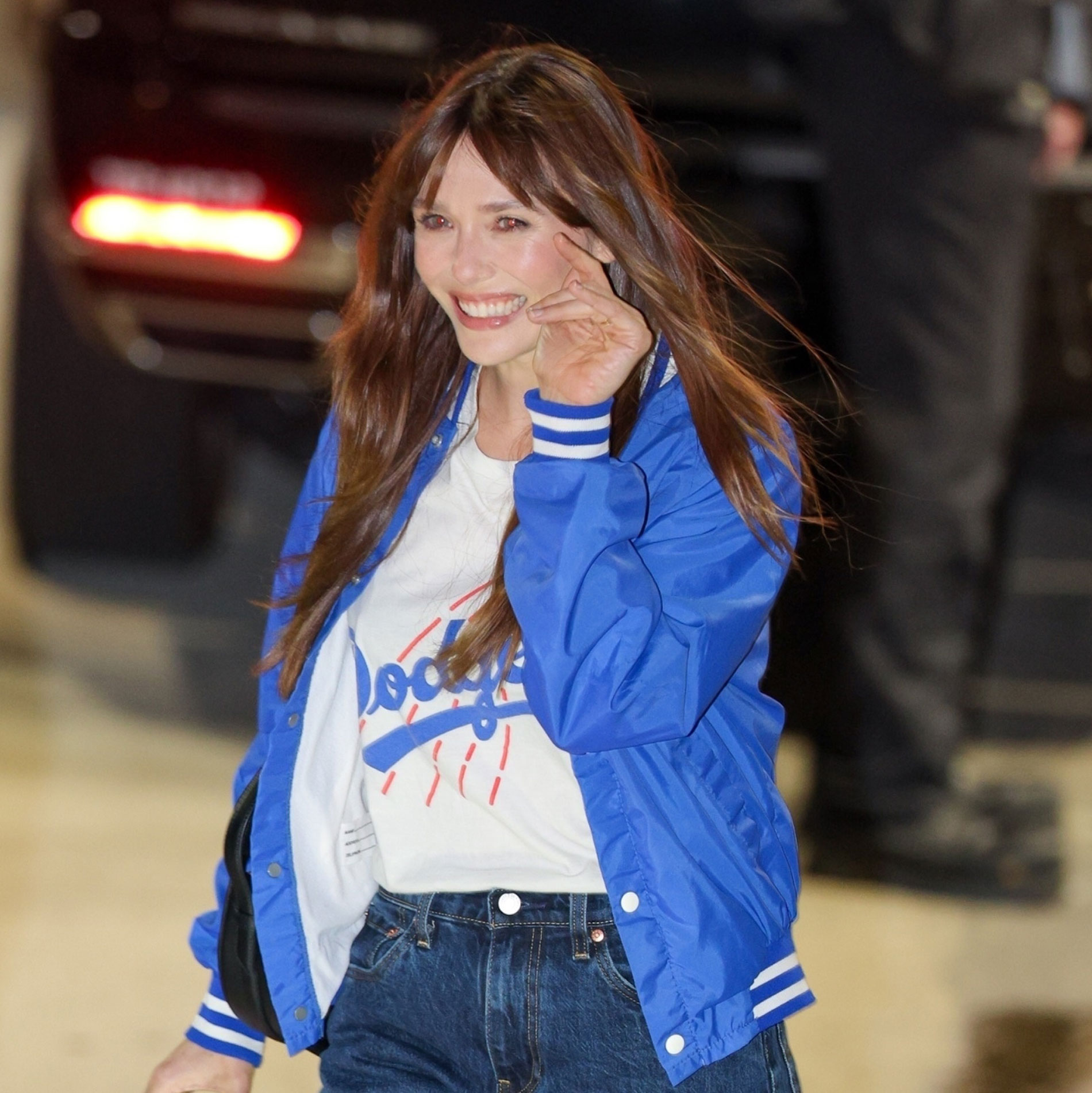 Elizabeth Olsen wears The Row zip-up boots