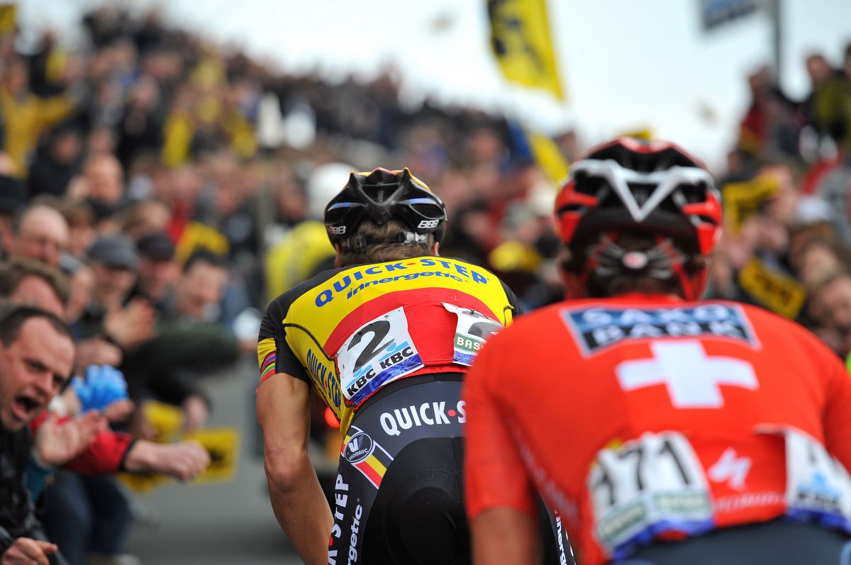 Fabian Cancellara following Tom Boonen at the 2012 Flanders