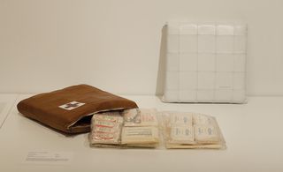 First aid kit in brown leather bag