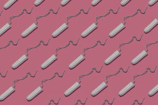 Menstrual cycle phases: Tampons on pink background