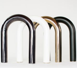 Equipt u shaped weights in silver, gold, chrome and black against grey background