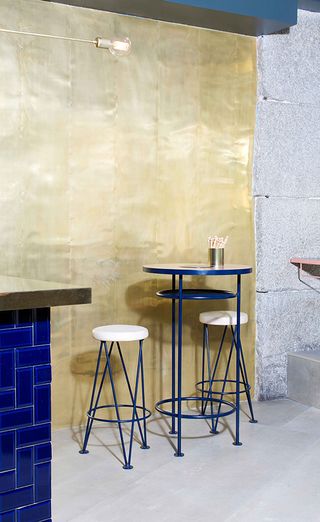 High stools and posing table at Bocadillo de jamon y champan