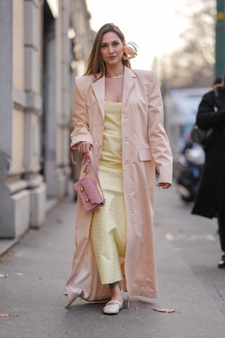 women wearing butter yellow at milan fashion week