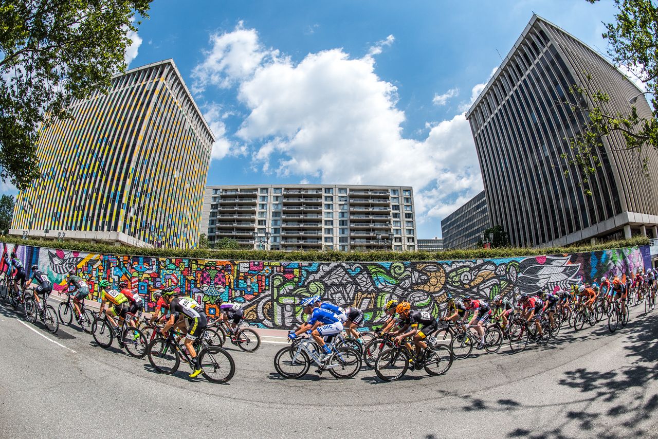 Riders pass by graffiti today