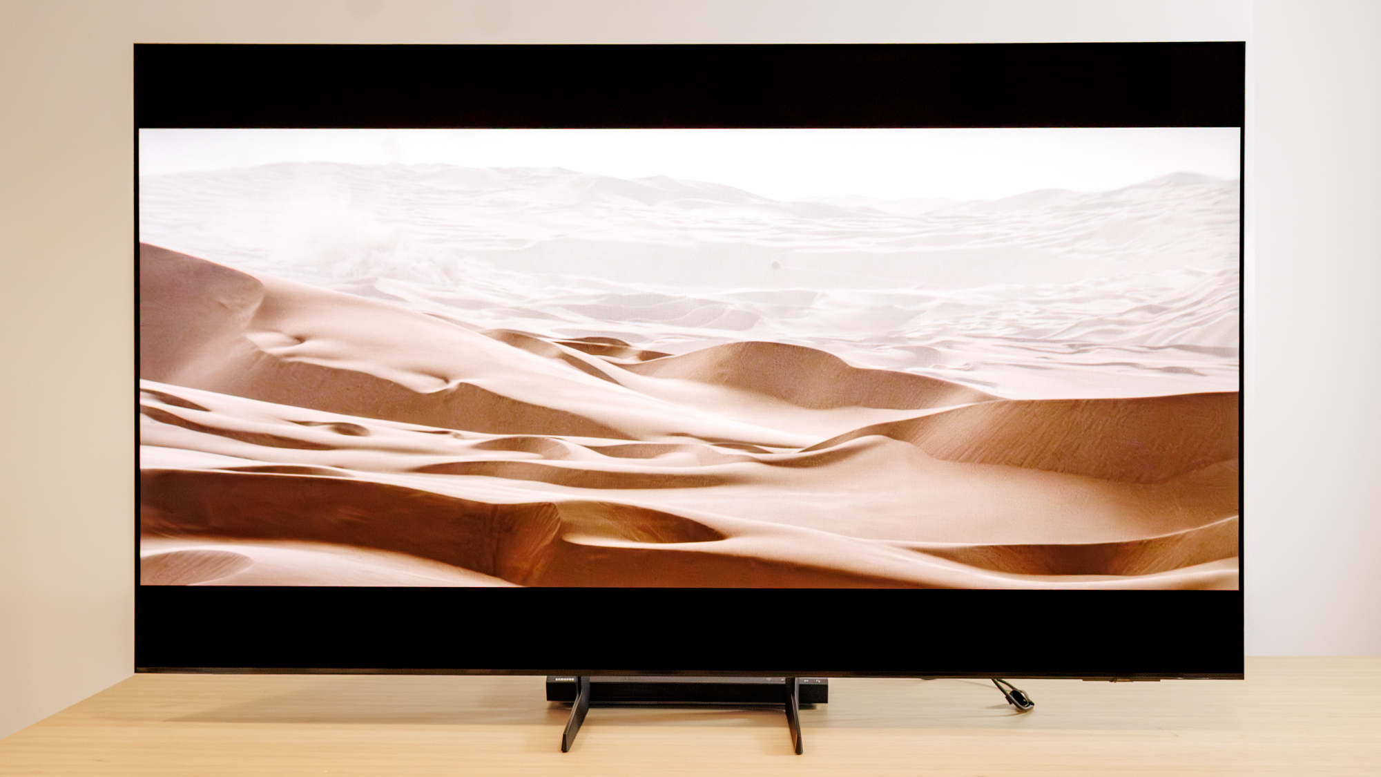 Samsung OLED S85F TV on a table