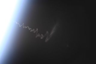 David Saint-Jacques snapped this photo from the International Space Station April 4 of the launch trail left by the Progress 72 cargo spacecraft.