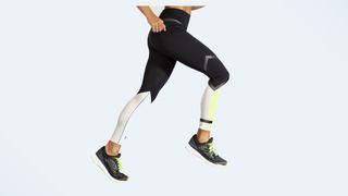A photo of a runner wearing the brooks carbonite leggings