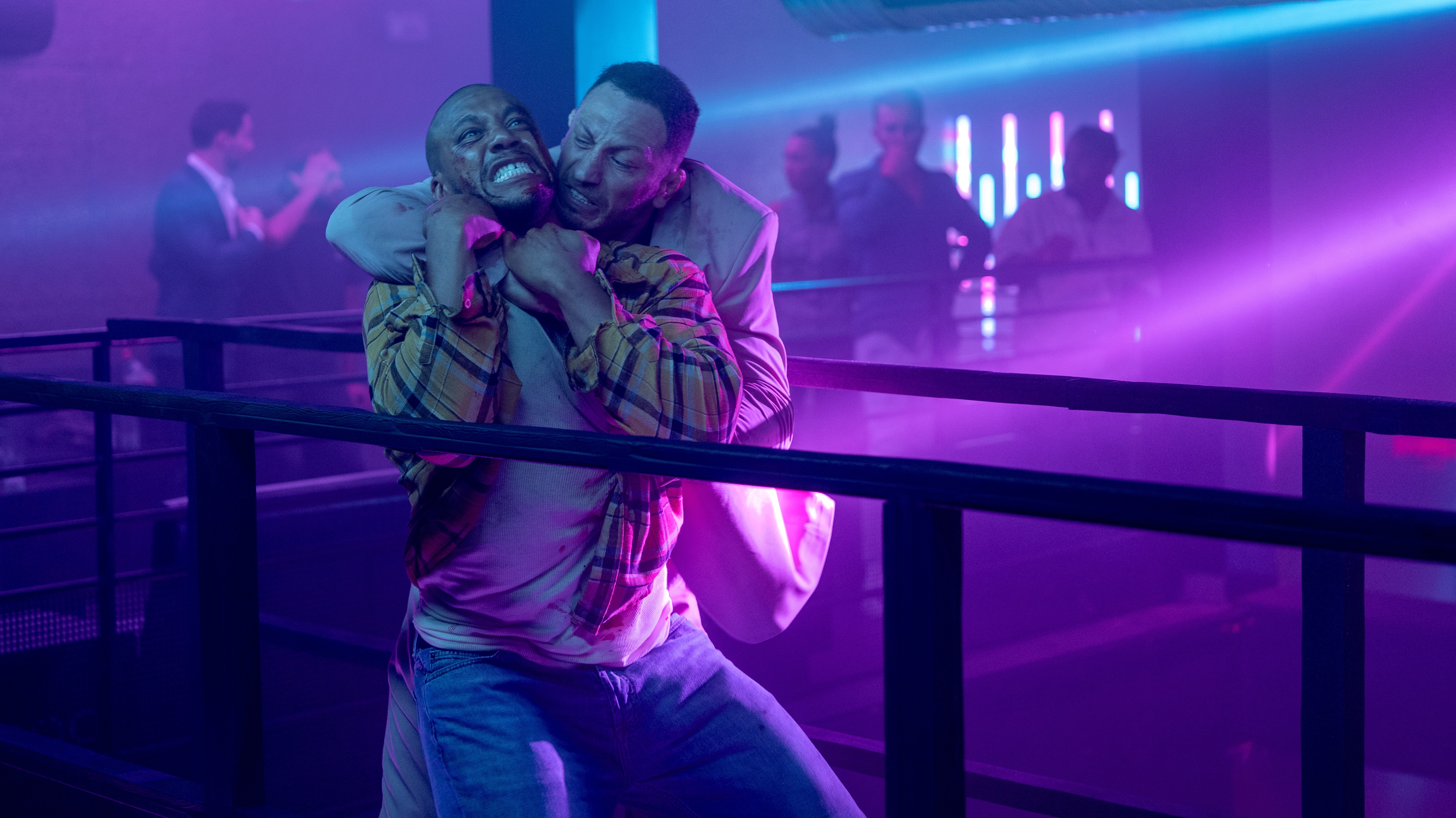 Bastien (Ciryl Gane) being grappled by a bouncer in a scene from Netflix's "K.O."