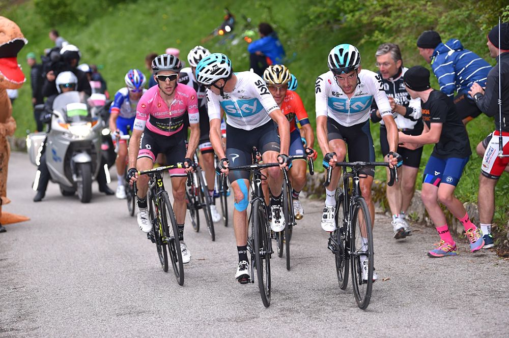 Chris Froome (Team Sky) looks back at maglia rosa Simon Yates (Mitchelton-Scott)