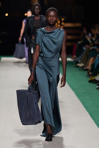 victoria beckham blue draped dress at paris fashion week spring summer 2025