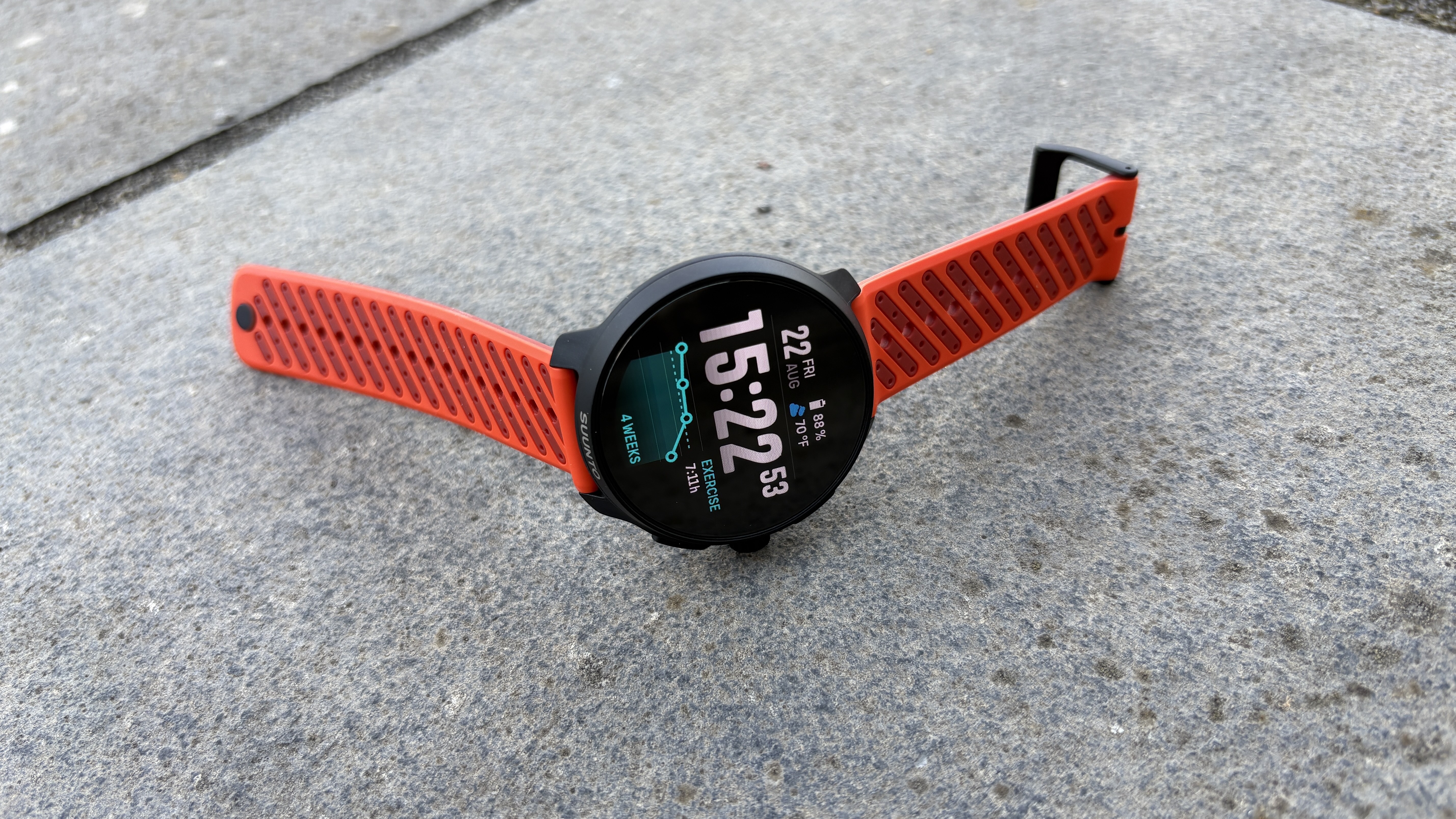 Suunto Race 2 on a sidewalk