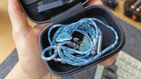 Photos of the blue Juzear Defiant IEM. 