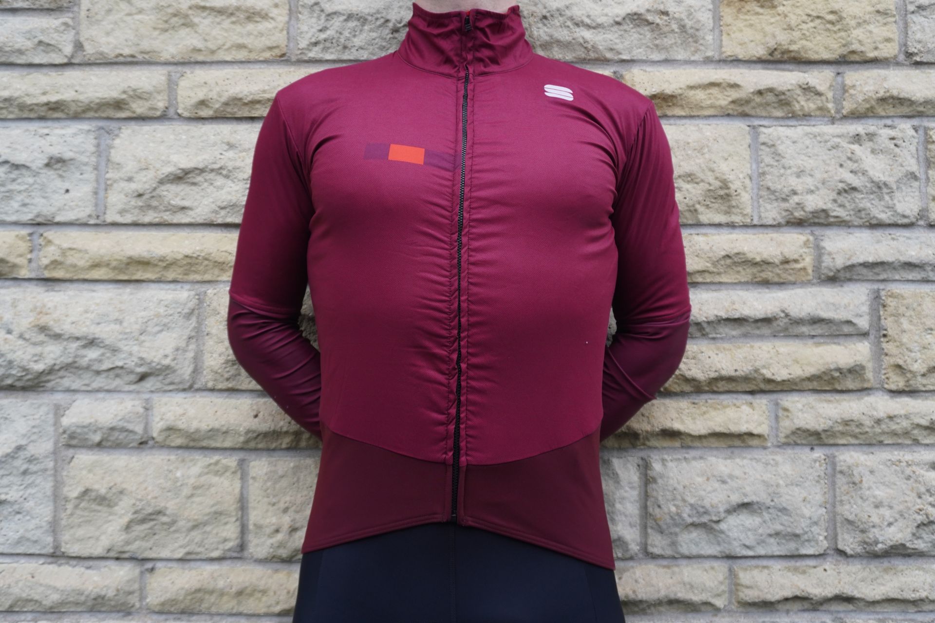 Male cyclist wearing Sportful Bodyfit Pro Jacket.