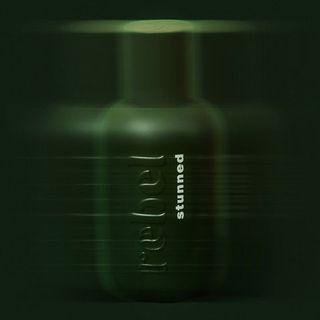 bel rebel's stunned cannabis perfume in green bottle
