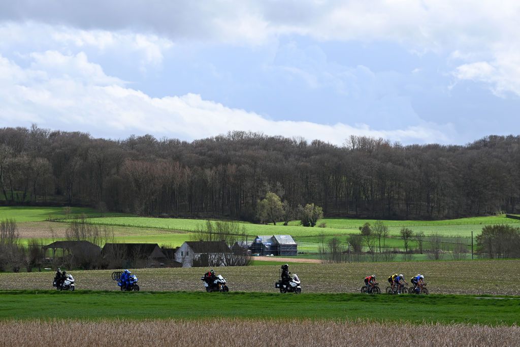 HARELBEKE BELGIUM MARCH 24 A general view of Matej Mohori of Slovenia and Team Bahrain Victorious Wout Van Aert of Belgium and Team JumboVisma Tadej Pogaar of Slovenia and UAE Team Emirates Nathan Van Hooydonck of Belgium and Team JumboVisma Sren Kragh Andersen of Denmark and Team AlpecinDeceuninck and Mathieu Van Der Poel of The Netherlands and Team AlpecinDeceuninck compete in the breakaway during the 66th E3 Saxo Bank Classic Harelbeke 2023 a 2041km one day race from Harelbeke to Harelbeke on UCIWT March 24 2023 in Harelbeke Belgium Photo by Tim de WaeleGetty Images