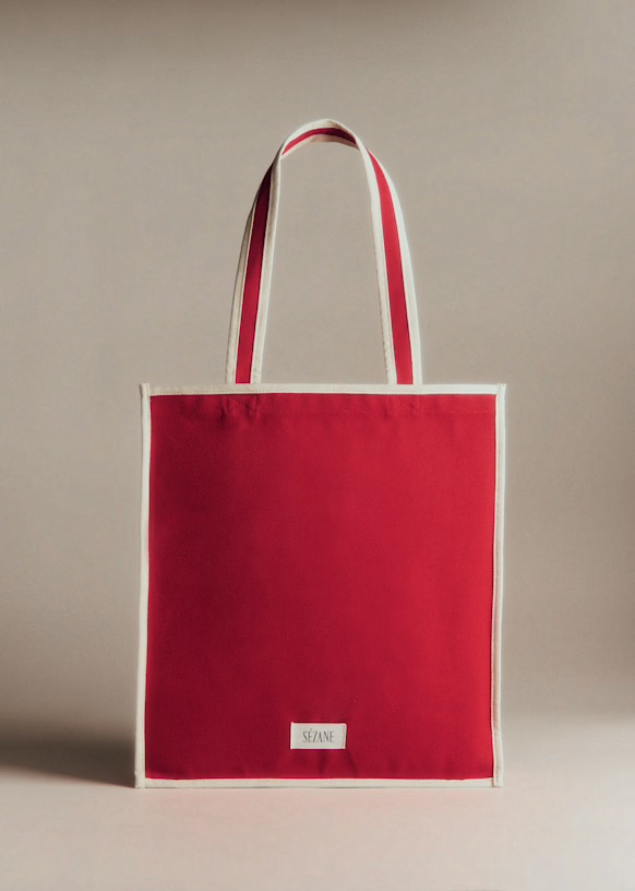a Sezane red tote bag with white trim