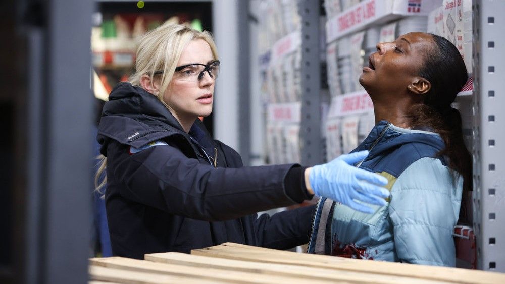 Kara Killmer as Sylvie Brett, TC Rose as victim in Chicago Fire season 12