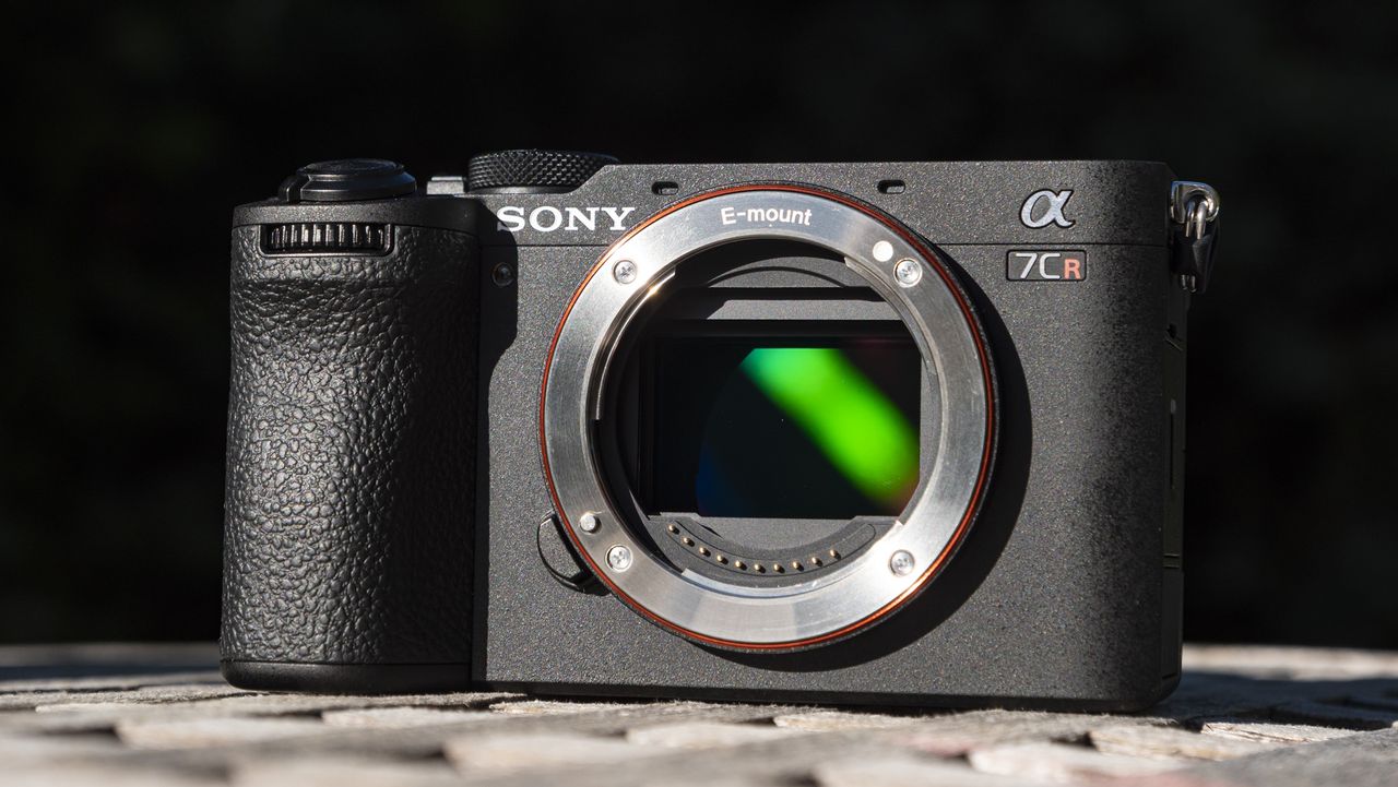 Sony A7C R mirrorless camera outside on a wooden table