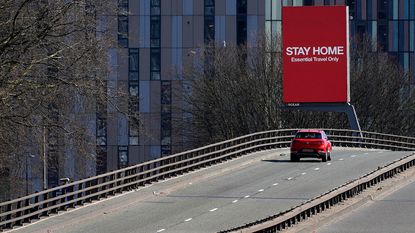 Car on an empty road during lockdown