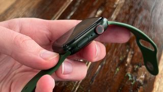 Apple Watch Series 7 review, watch in the hand, showing the green colour