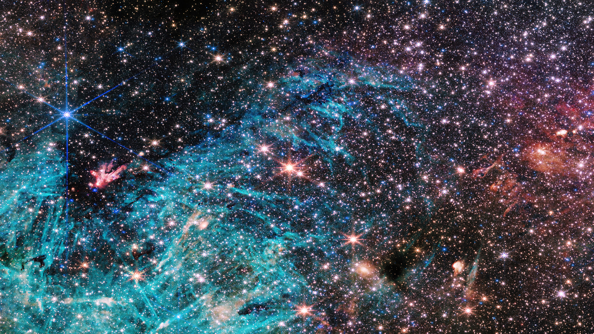 A series of glowing colors in deep space.