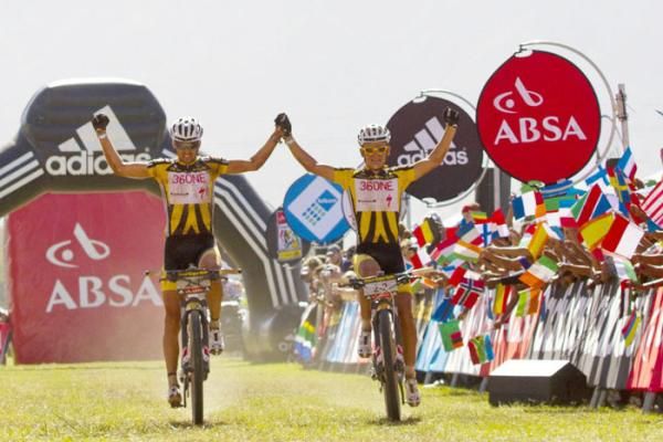 Christoph Sauser and Burry Stander celebrate winning the stage during stage 1 of the 2011 Absa Cape Epic Mountain Bike stage race held from Saronsberg Wine Estate in Tulbagh, South Africa on the 28 March 2011