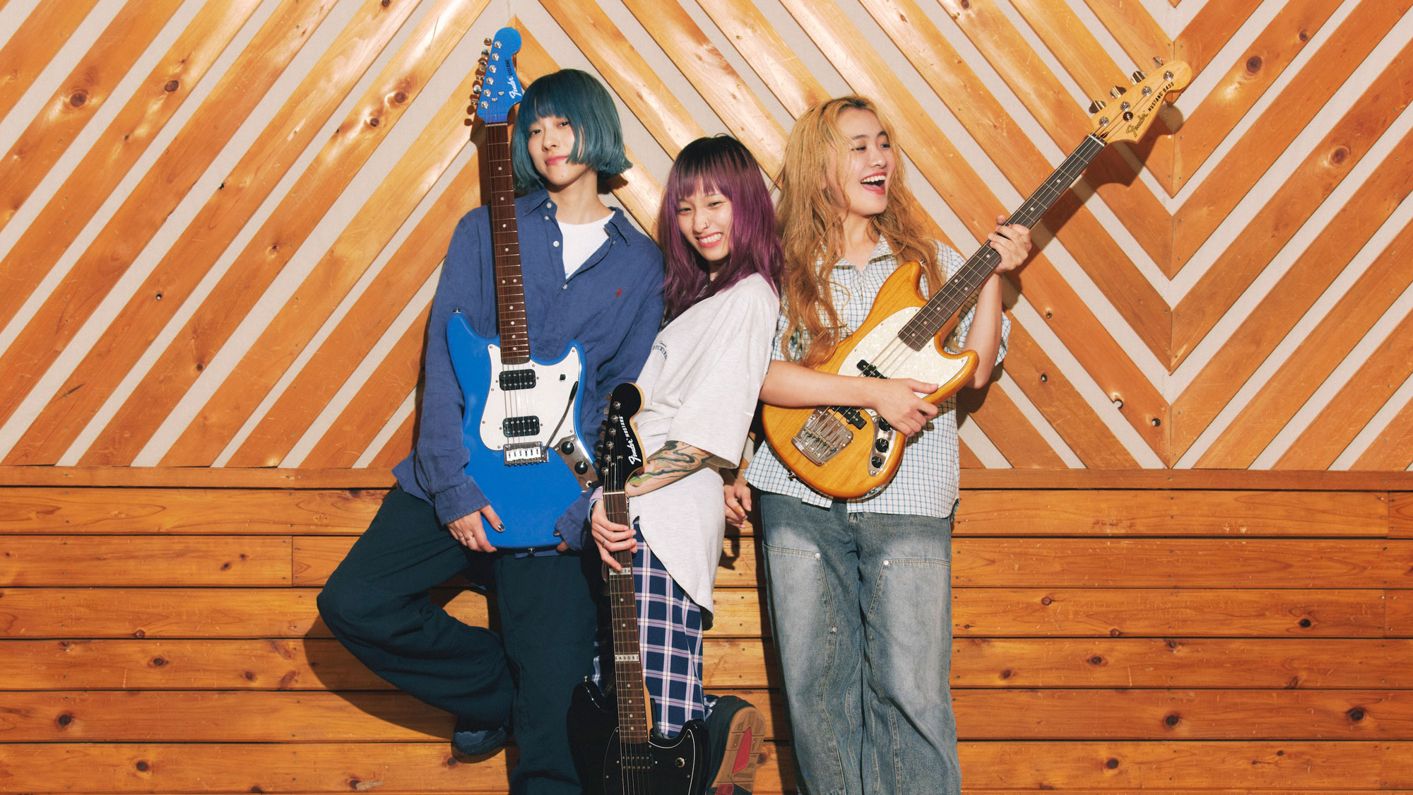 Chilli Beans. pose with their Fender Japan signature models