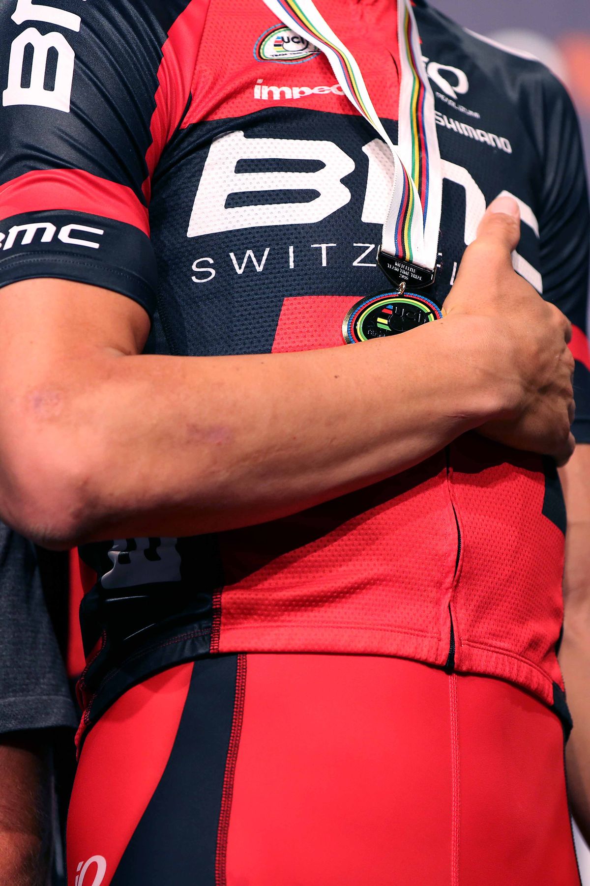 Taylor Phinney with hand over heart at the anthem plays