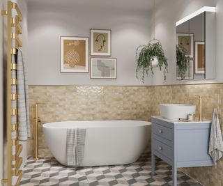 white freestanding bath in bathroom with grey and white tiled floor, gold towel rail, grey vanity untit, mirrored cabinet on wall, floor mounted gold bath tap