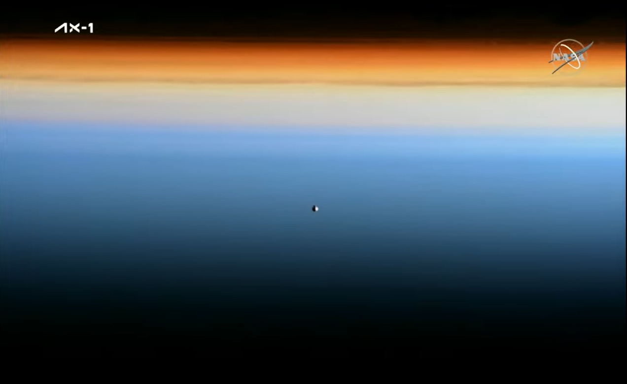SpaceX's Crew Dragon Endeavor with the Ax-1 crew approaches the International Space Station during an orbital sunrise during docking April 9, 2022.