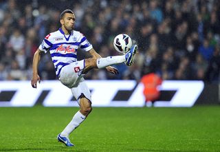 Queens Park Rangers' Portuguese defender Jose Bosingwa clears the ball during their English Premier League football match against Everton at Loftus Road in London on October 21, 2012.