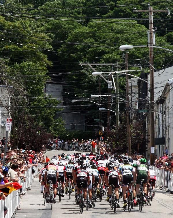 The men's peloton begins their ascent of the Manayunk Wall.