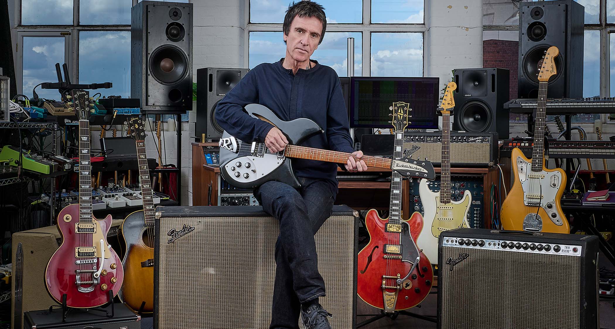 Johnny Marr in his studio with some of the guitars that are heading to auction on September 17, 2026.