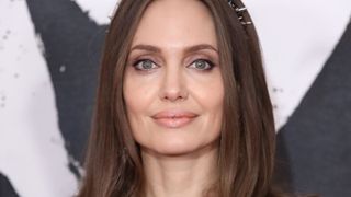 Angelina Jolie wearing eye makeup look blue eyes