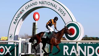 Nick Rockett ridden by Patrick Mullins celebrates as they cross the line to win the Randox Grand National Handicap Chase during Grand National Day at Aintree Racecourse on April 05, 2025.